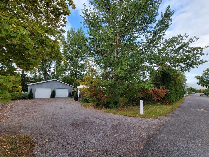 Property Photo:  8245 Pheasant Drive  MT 59808 
