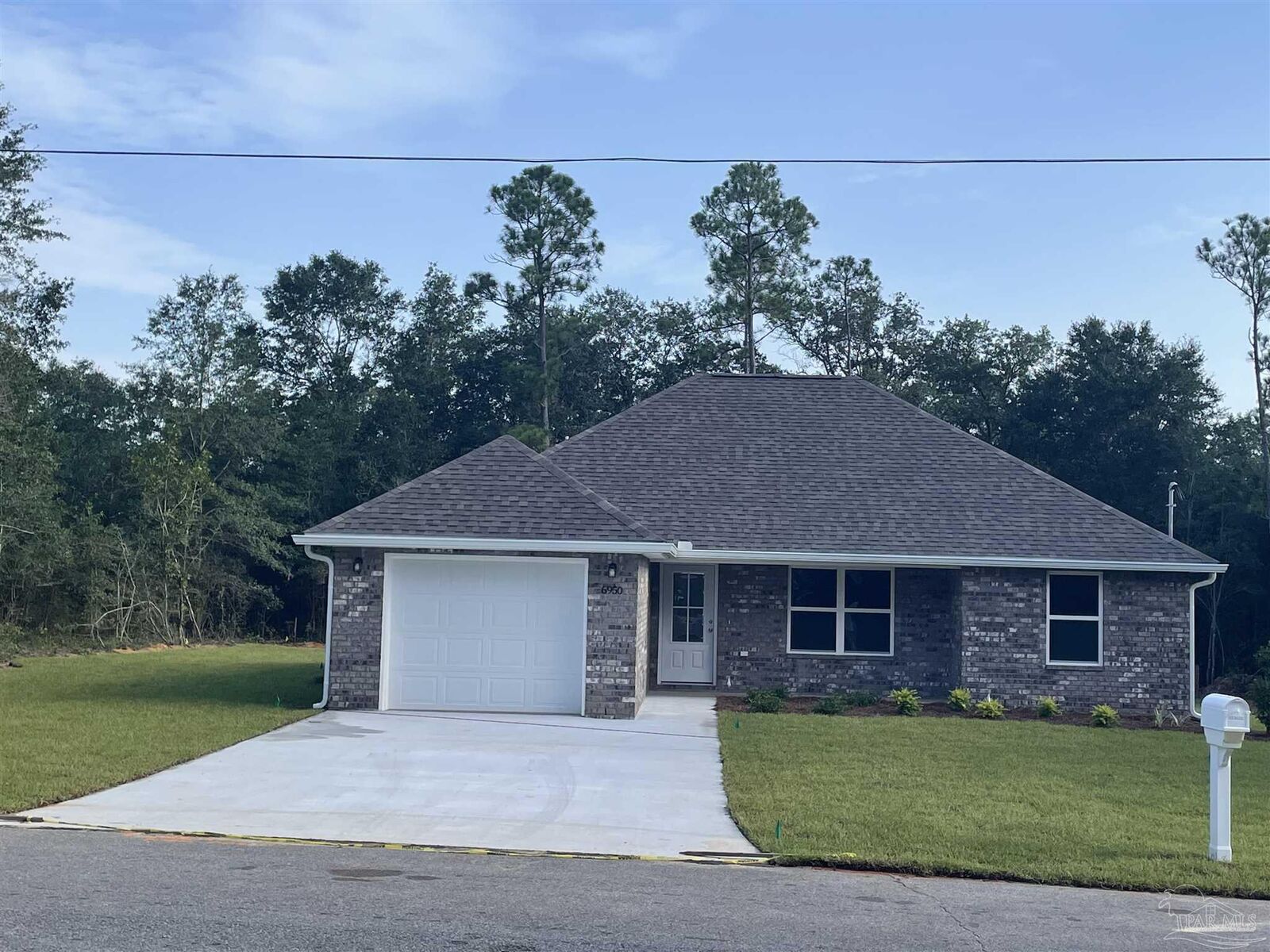 Property Photo:  6761 Harvell St  FL 32570 