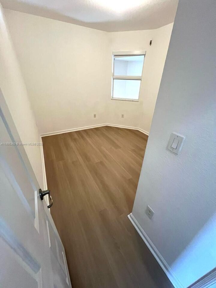 Property Photo:  11601 NW 89th St 211  FL 33178 