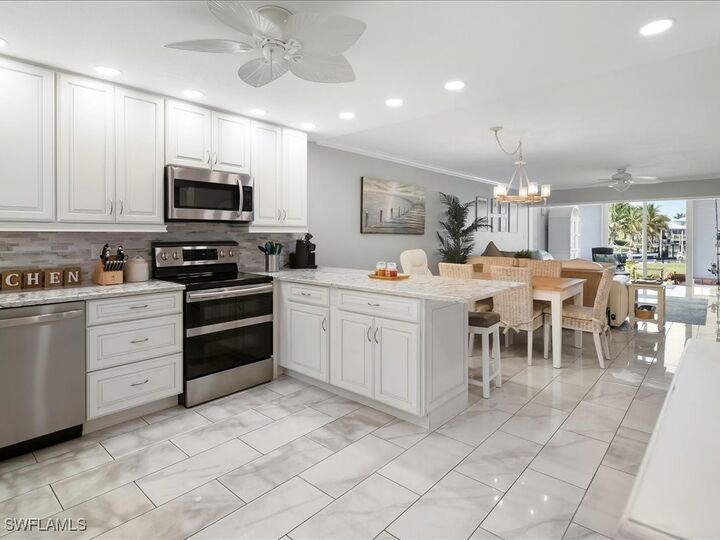 Property Photo:  1128 Bald Eagle Drive 102  FL 34145 