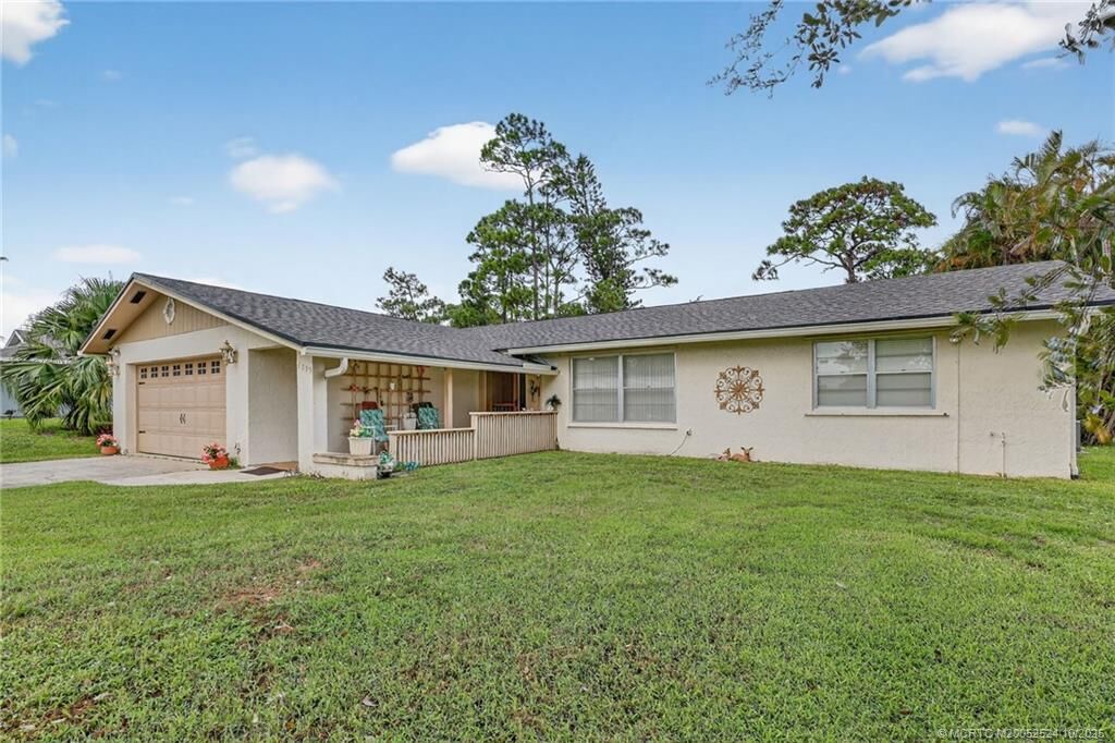 Property Photo:  6299 SE Poinciana Lane  FL 33455 
