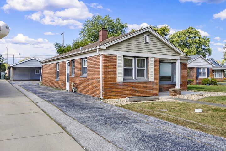 Property Photo: 11712 S Troy Drive IL 60803