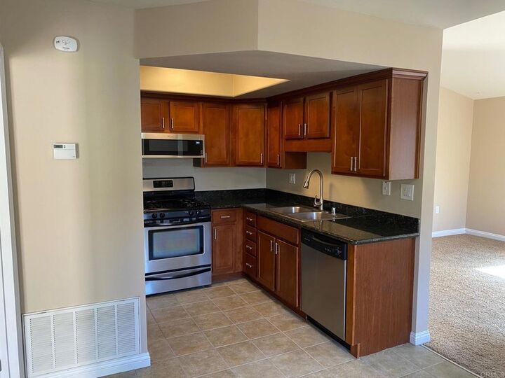 Property Photo:  100 Sea Cliff Way 104  CA 92056 