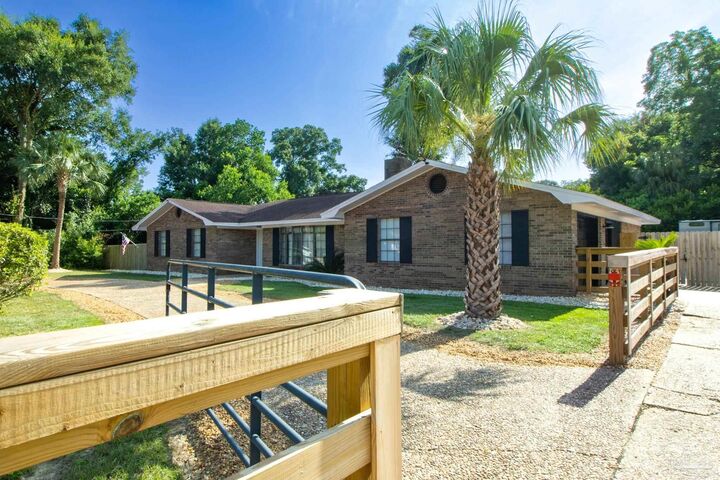 Property Photo:  605 N 69th Ave  FL 32506 