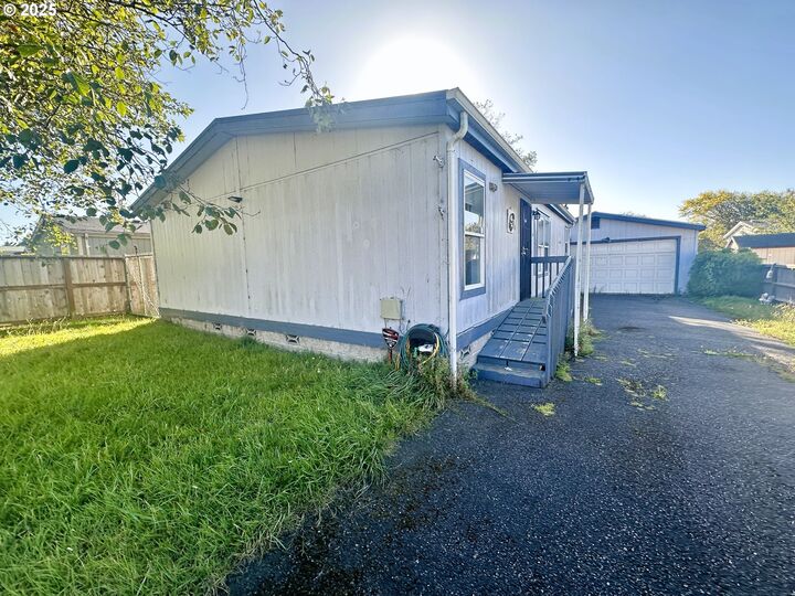 Property Photo:  63780 Wallace Rd  OR 97420