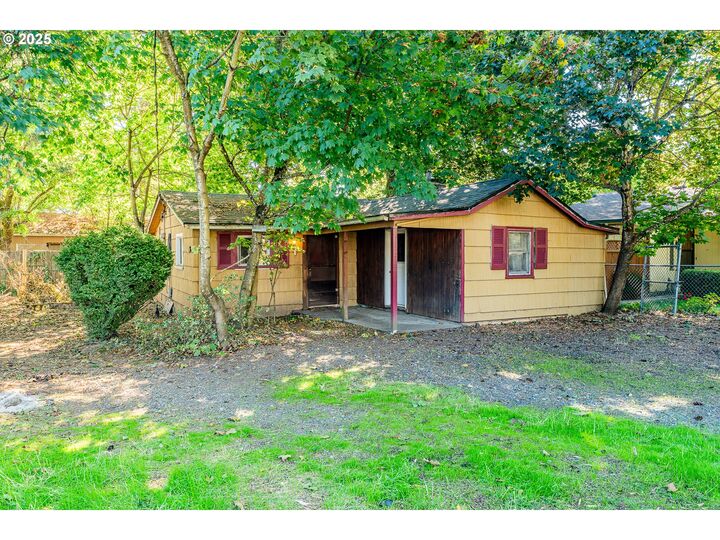 Property Photo:  11126 SE Boise St  OR 97266 