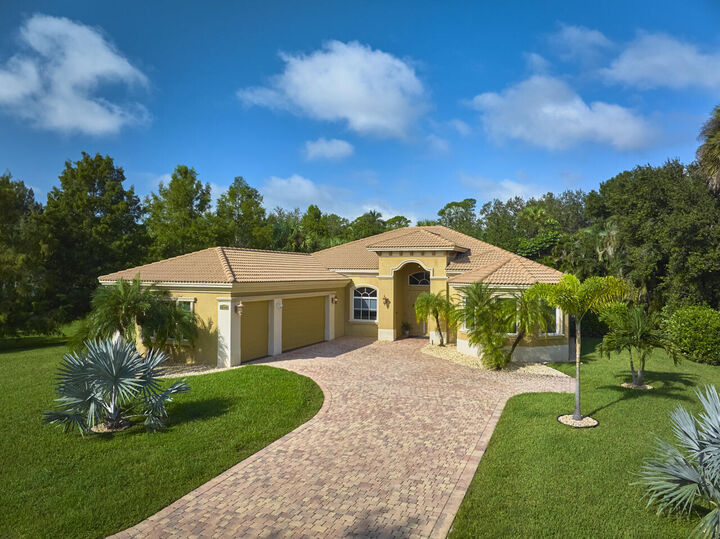 Property Photo: 8300 SW Cattleya Drive FL 34997