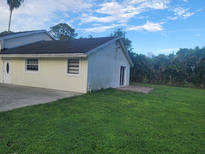 Property Photo:  15664 North Road A  FL 33470 