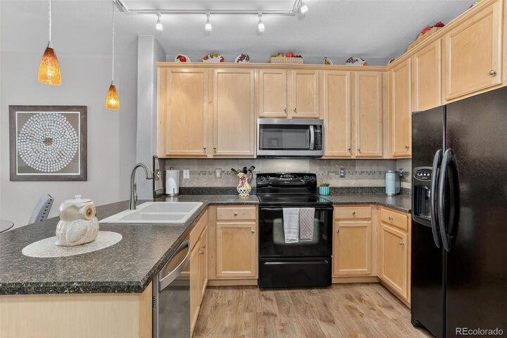 Property Photo: 15540 Canyon Gulch Lane 208 CO 80112