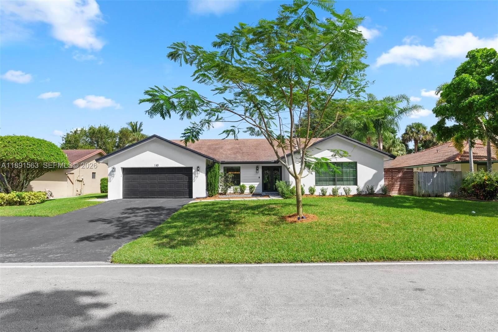 Property Photo: 140 Torchwood Ave FL 33324