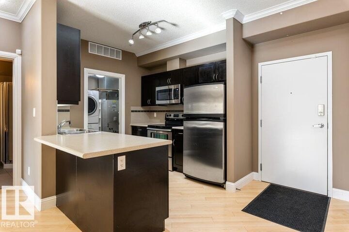 Property Photo: 14604 125 Street NW 104 AB T5X 0B4