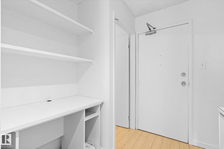Property Photo: 10175 114 Street NW 104 AB T5K 2L4