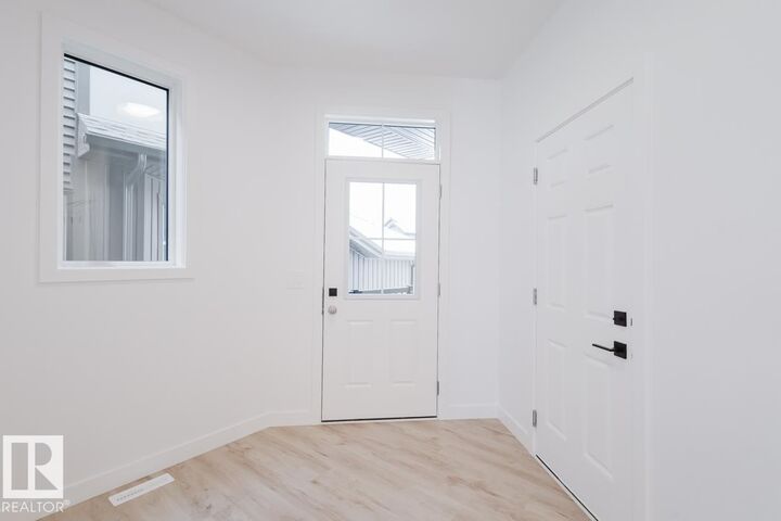 Property Photo: 2130 Crossbill Lane NW AB T5S 0W3