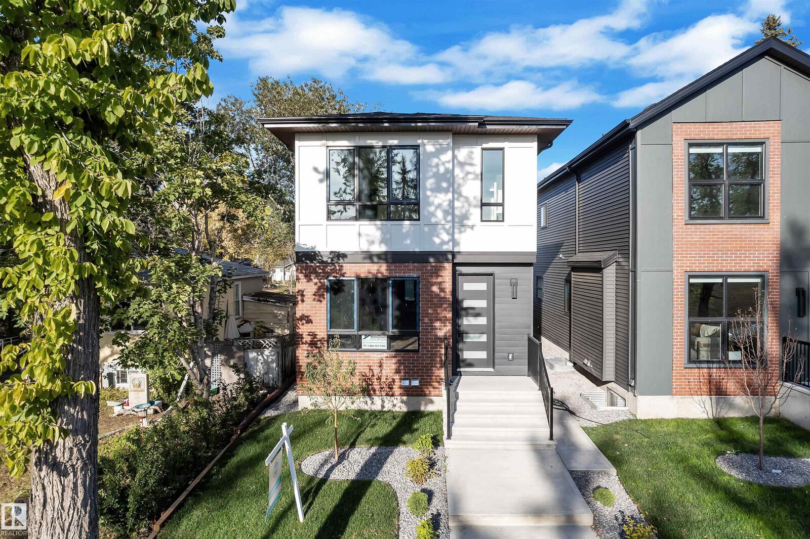 Property Photo: 10725 132 Street NW AB T5M 1C8