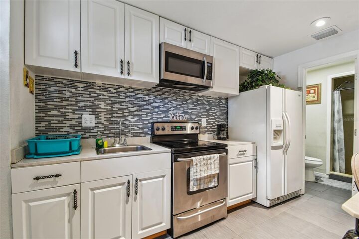 Property Photo:  1377 S Washington Avenue  FL 33756 