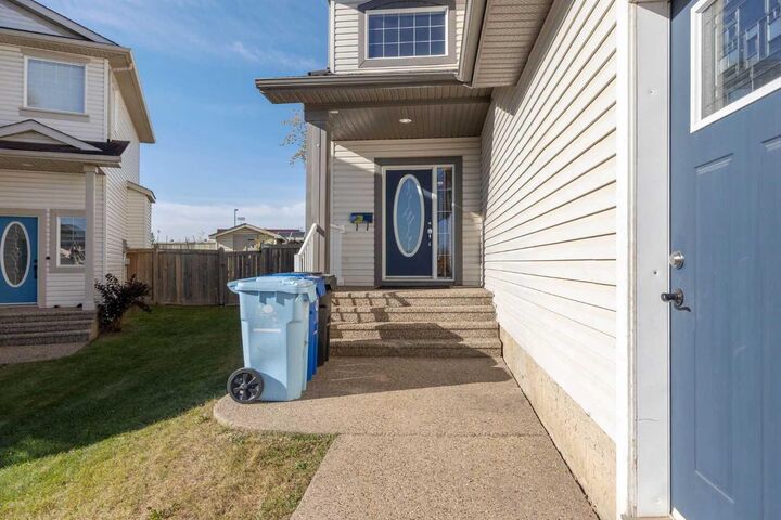 Property Photo: 150 Plamondon Way AB T9K 0A6