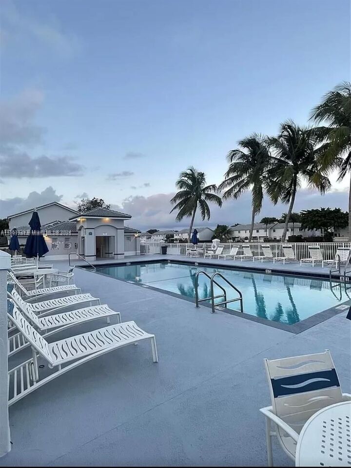 Property Photo: 14212 SW 121st Pl 6 FL 33186