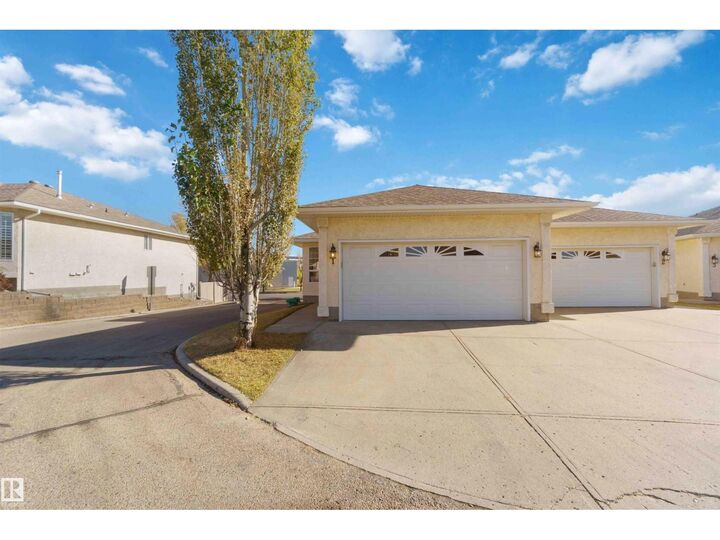 Property Photo: #1 14428 Miller Bv NW AB T5Y 2Y6