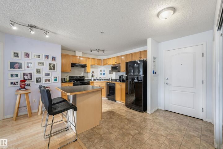 Property Photo: 5350 199 Street NW 228 AB T6M 0A4