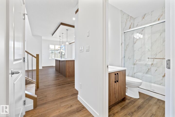 Property Photo: 123 Ficus Way AB T8L 1X8