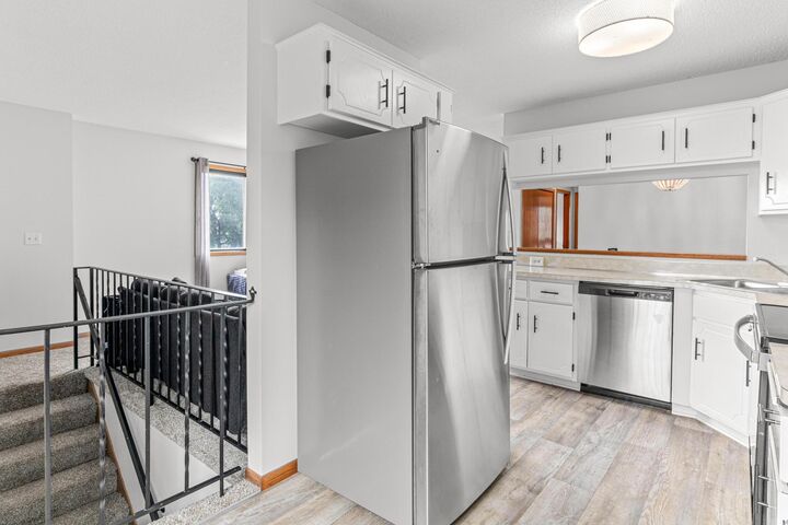 Property Photo: 7610 15th Street Lane N 907 MN 55128