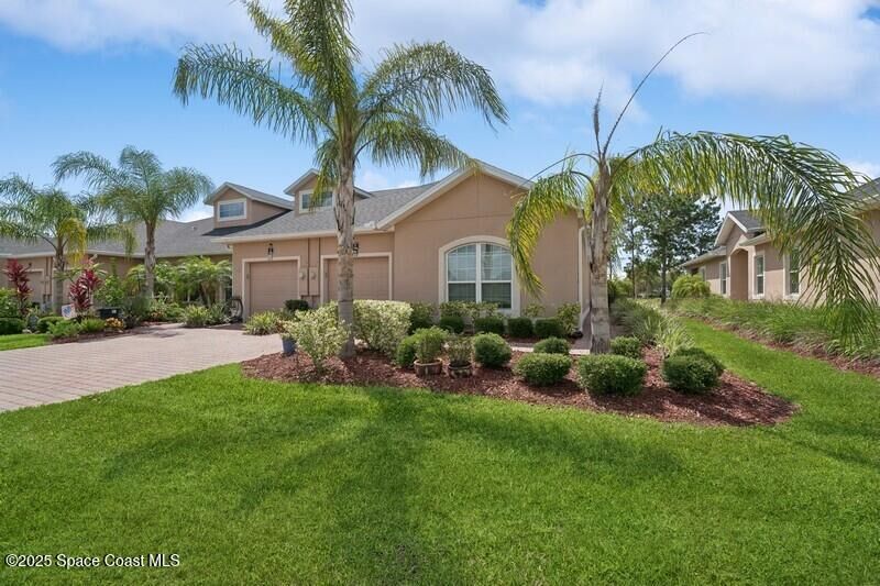 Property Photo: 590 Remington Green Drive SE FL 32909