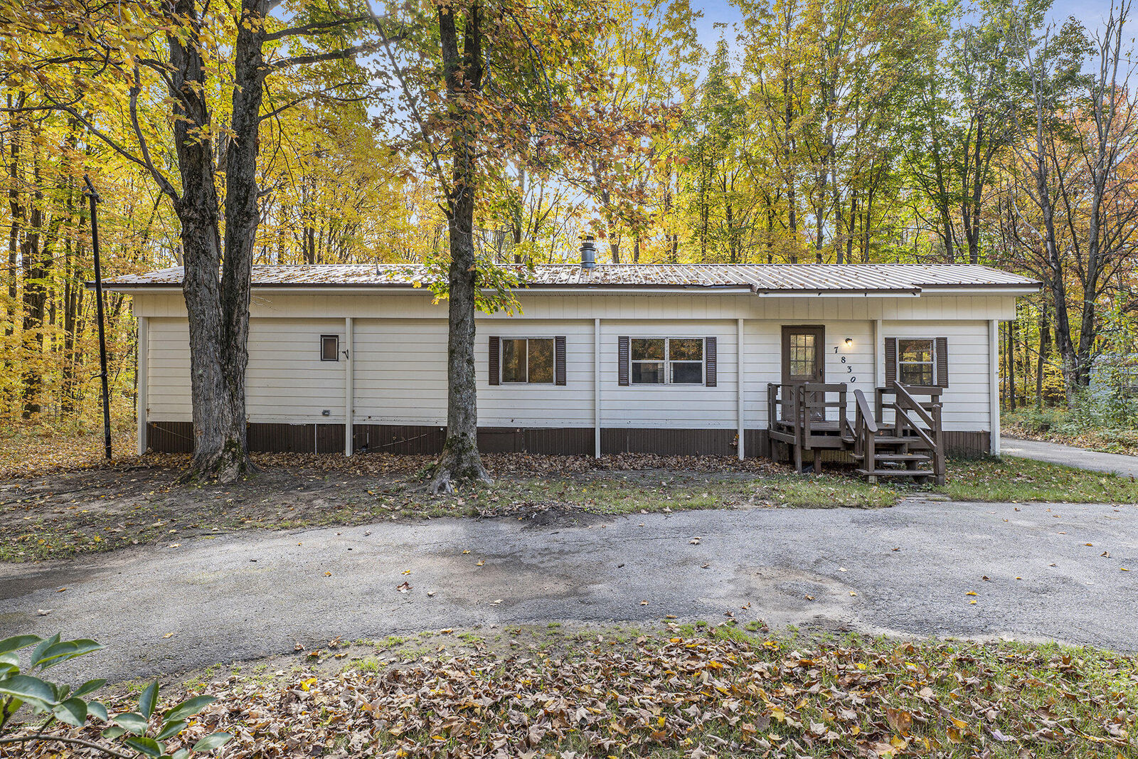 Property Photo:  7830 Larkspur Drive  MI 49659