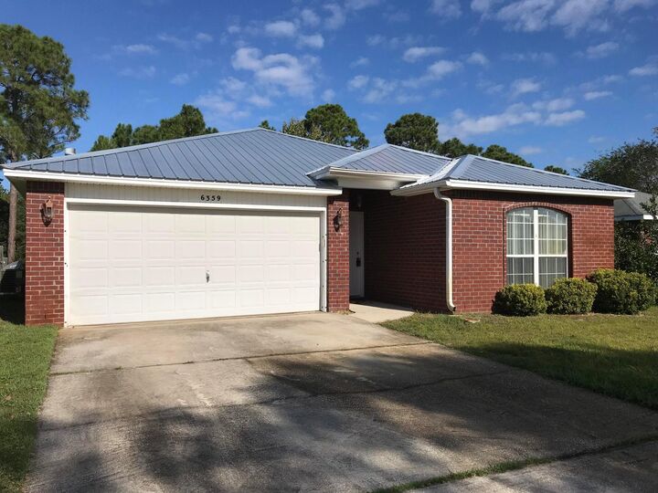 Property Photo: 6359 Heronwalk Drive FL 32563