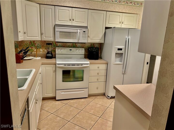 Property Photo: 4187 Lakewood Boulevard E13 FL 34112