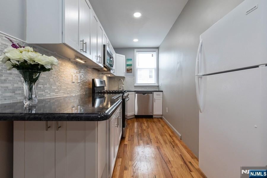 Property Photo:  115-117 66th Street 9  NJ 07093