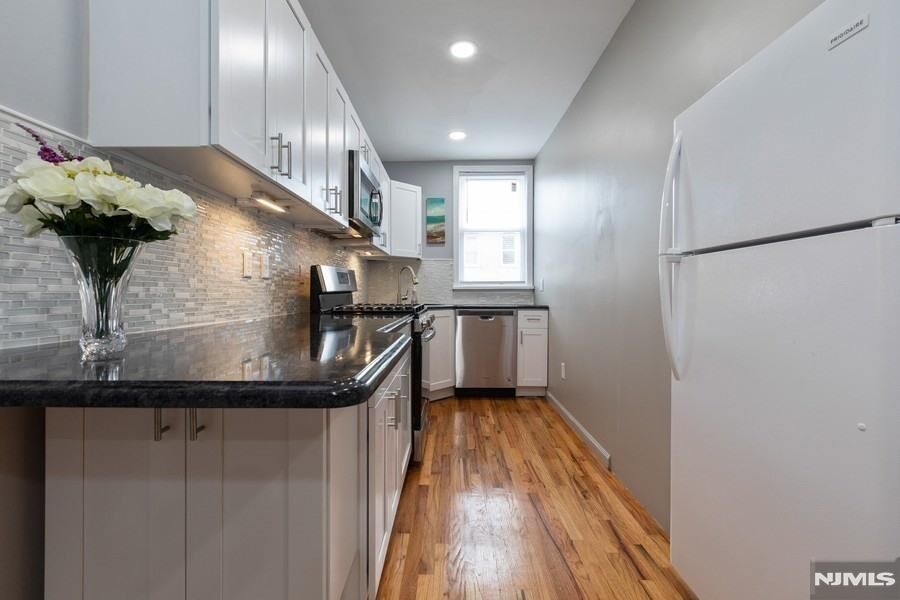 Property Photo:  115-117 66th Street 9  NJ 07093 