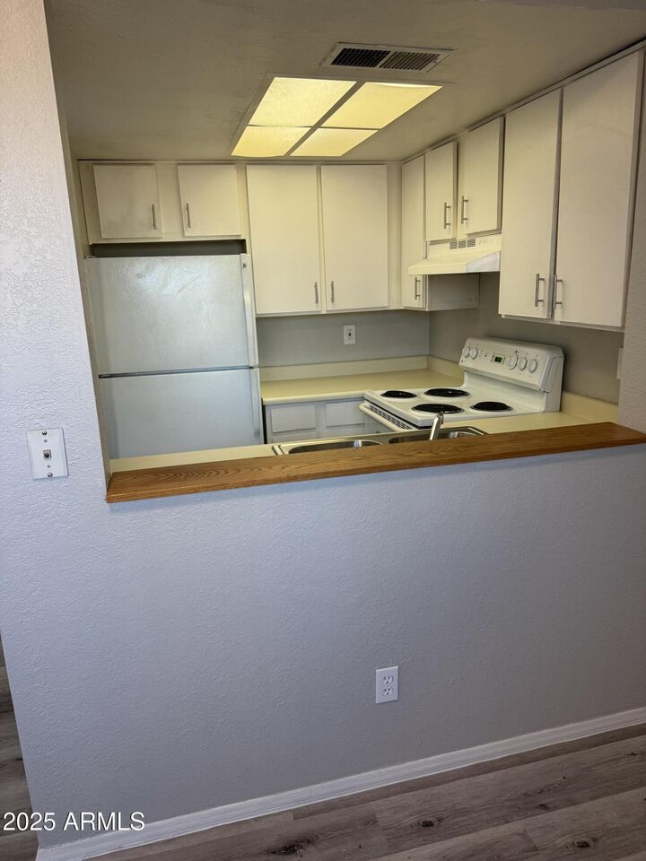 Property Photo:  7221 E Granada Road 2  AZ 85257 