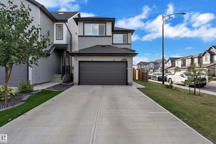 Property Photo:  9990 205A Street NW  AB T5T 7N4 