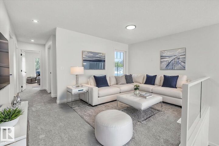 Property Photo: 1154 Gyrfalcon Crescent NW AB T5S 0S1
