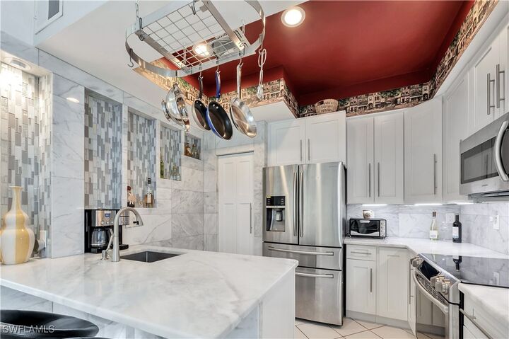 Property Photo:  15063 Sterling Oaks Drive  FL 34110 