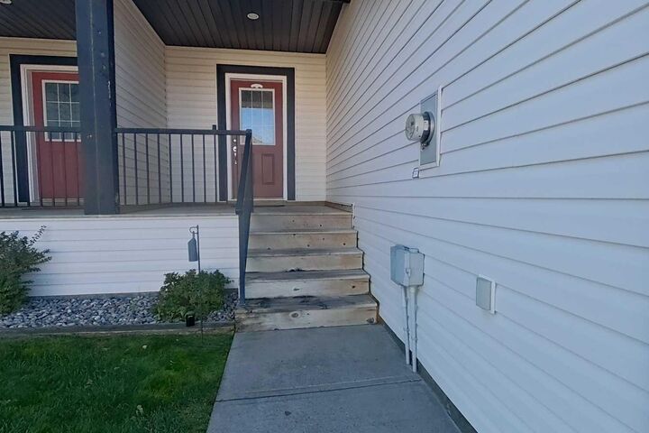 Property Photo: 295 Blackfoot Road W 4 AB T1K 8A6