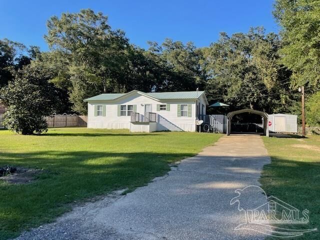 Property Photo: 8583 Cove Ave FL 32534
