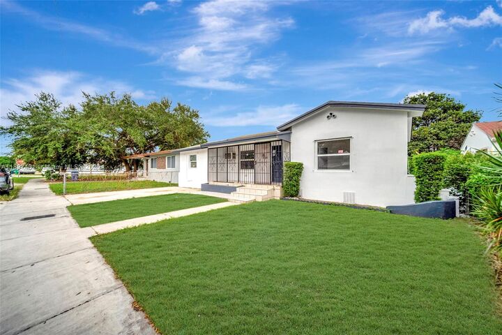 Property Photo:  919 NW 76th St  FL 33150 