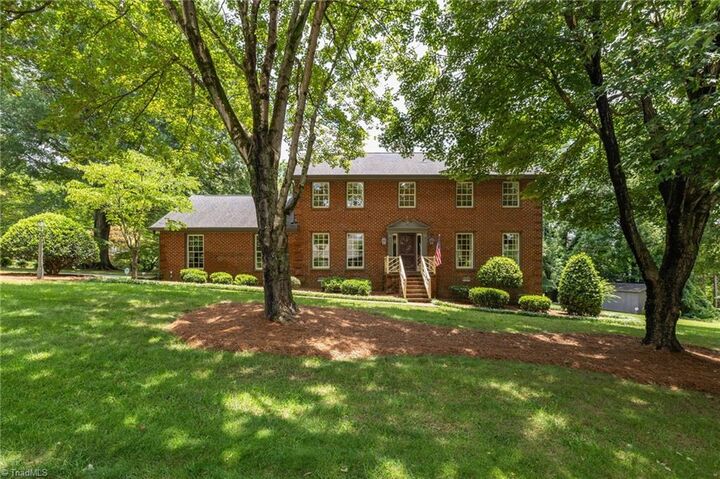 Property Photo:  6001 Muirfield Drive  NC 27410 