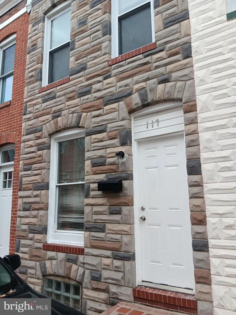 Property Photo: 117 N Glover Street MD 21224