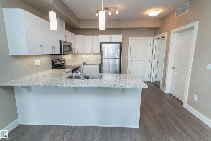 Property Photo:  5001 Eton Boulevard 114  AB T8H 0N7 
