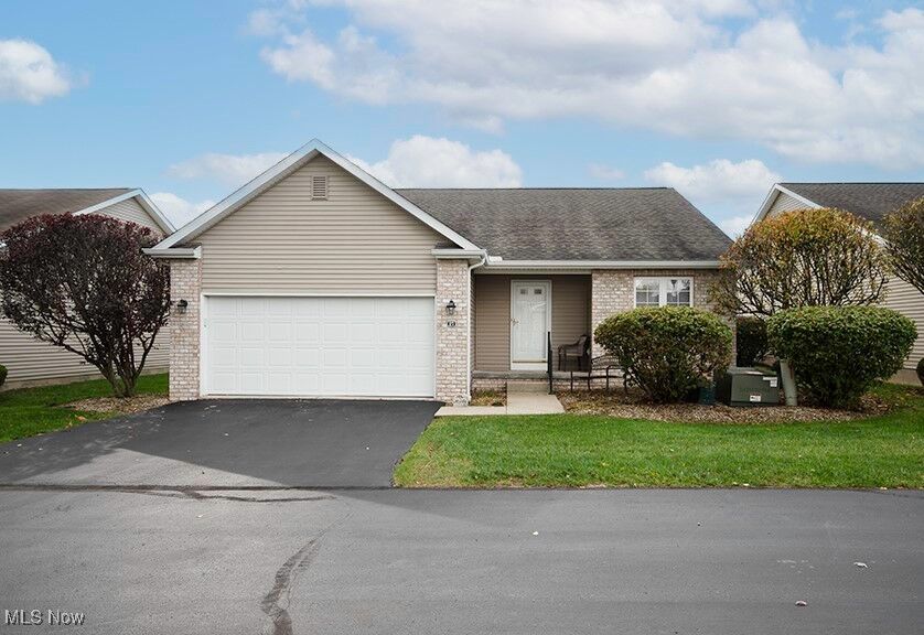 Property Photo: 27 Danbury Court NW OH 44481
