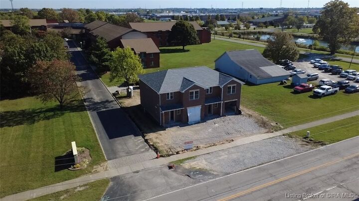 Property Photo:  2020 N Greentree Boulevard  IN 47129