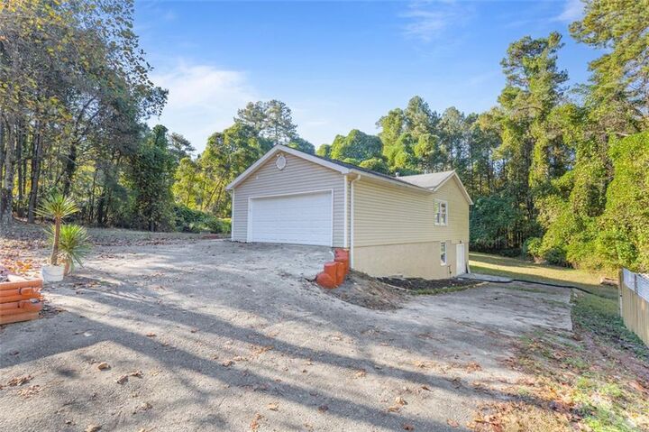 Property Photo:  667 Alcovy Forest Drive  GA 30045