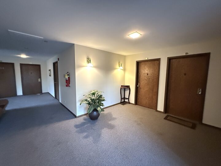 Property Photo: 7420 Grand Avenue 102B IL 60516