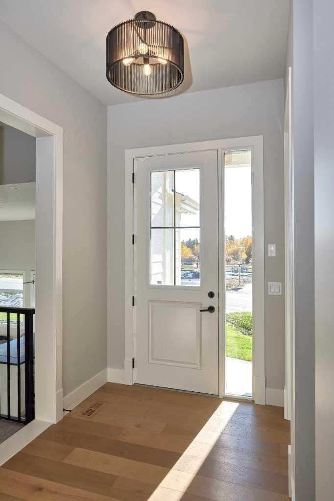 Property Photo:  510 Pine Creek Ridge  AB T1S 3V9