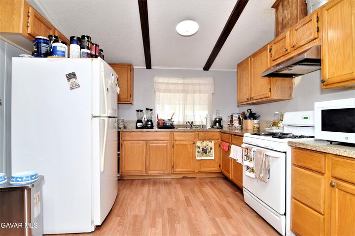 Property Photo:  45446 7th St East 21  CA 93535 
