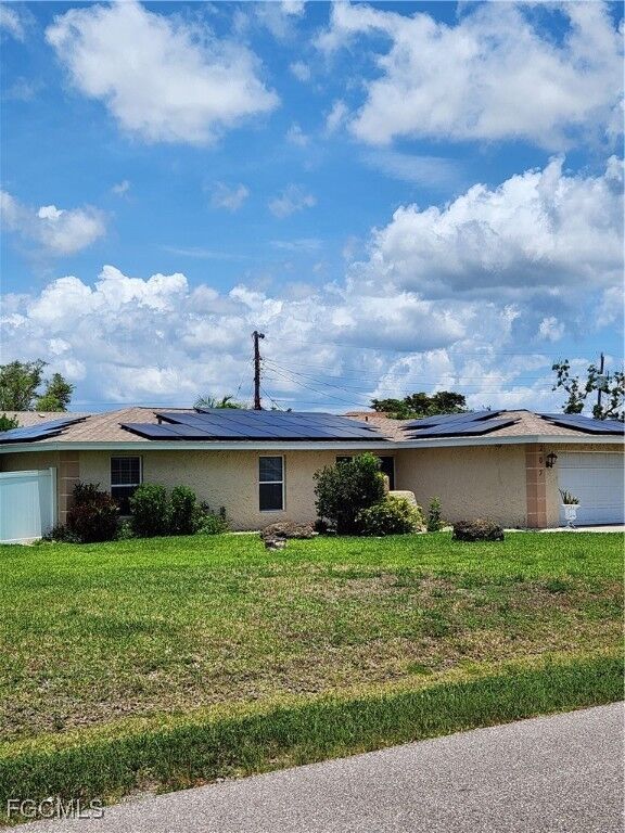 Property Photo:  207 SE 47th Terrace  FL 33904