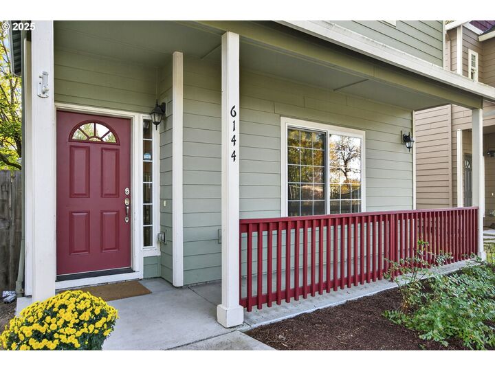 Property Photo:  6144 SE Duke St  OR 97206