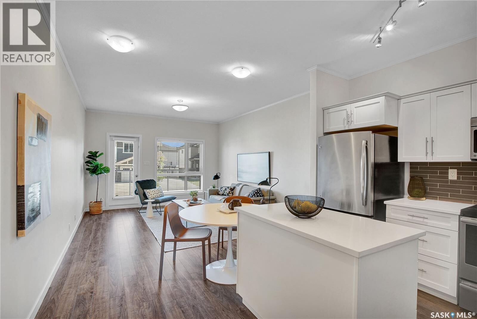 Property Photo:  112 545 Hassard Close  SK S7L 6V3